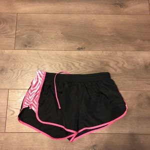 Pink and black sports shorts
